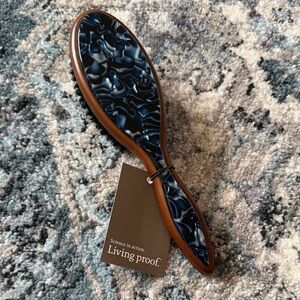 Living Proof Hair Brush with Navy and Wood Tones